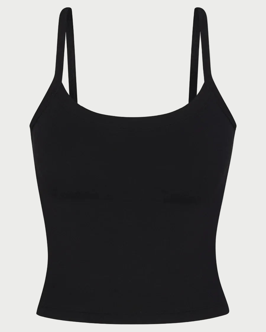 Black tank top with thin straps on a light gray background