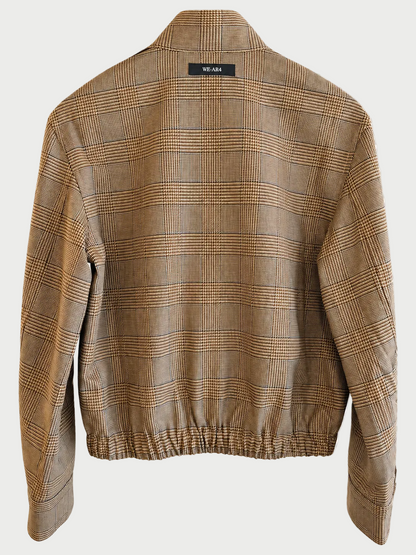 Back view of the limited edition WE-AR4 B Bomber by WE-AR4, featuring a beige plaid design, long sleeves, elasticated hem, and a small black label with white text near the collar, expertly crafted from upcycled wool.