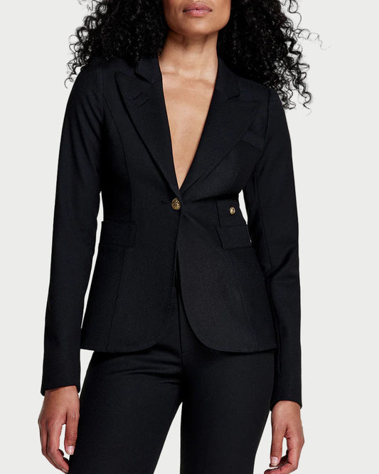 Woman wearing a black suit on a white background