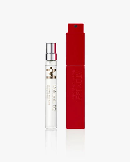 A clear Escentric Molecules Atomizer with "Molecule 02" labeling and a silver cap stands beside a sleek red travel case with a twist-and-spray feature, both from Escentric Molecules, set against a white background.