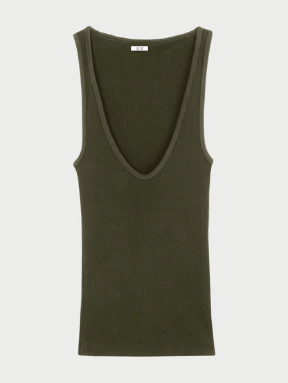 Green tank top on a beige background