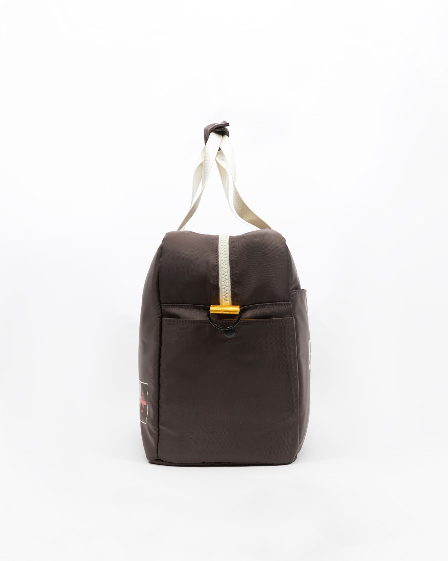 The Oncept Olympia Travel Bag by Oncept is a dark gray nylon laptop bag with a white strap and yellow zipper pull, shown from the side on a plain white background.