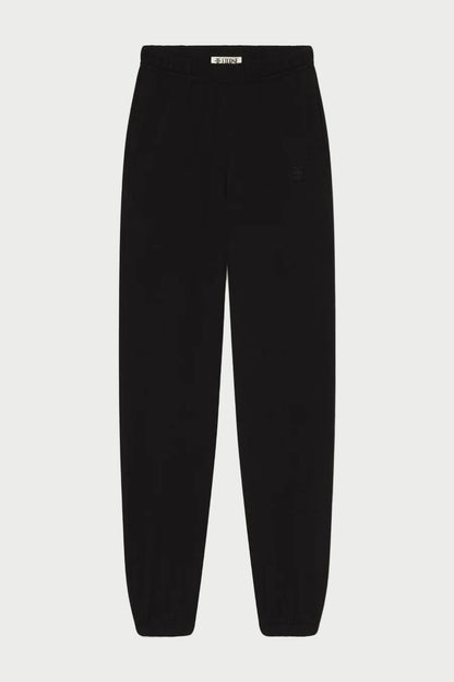 The Éterne Boyfriend Pocket Sweatpant by Eterne, in black French terry with an elastic waistband and cuffs, is displayed flat on a white background—an elevated loungewear essential featuring the relaxed fit of a classic boyfriend sweatpant.