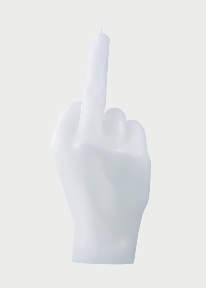A white F*ck You Candle Hand by 54° Celsius is shaped like a hand with the middle finger extended upwards, delivering a bold "f*ck you" gesture. The wick is positioned on the tip of the defiant middle finger, setting an unapologetically rebellious mood. The backdrop remains plain white.