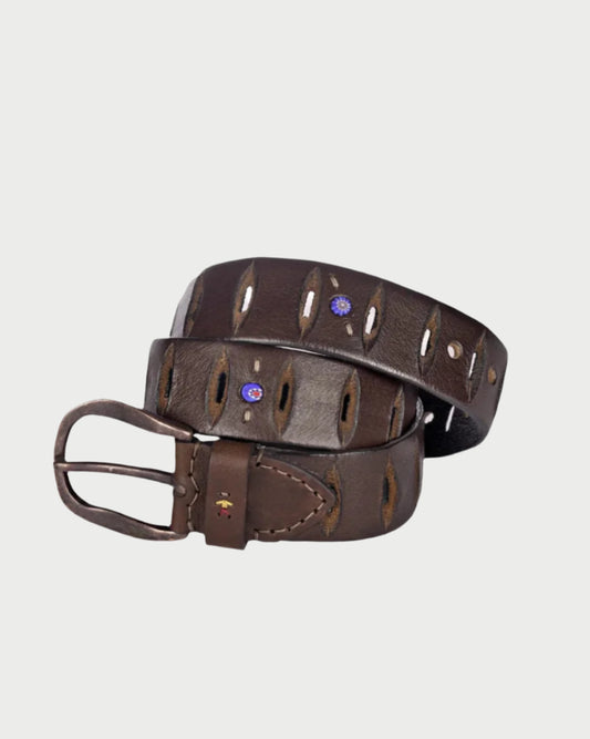 The HB Belt With Slits by Henry Beguelin is a dark brown calf leather belt with a brass buckle, featuring large oval cutouts and small purple gemstones. This adjustable belt is shown coiled in a spiral on a light grey background, offering perfect wearability.