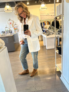 Kitt Shapiro boutique owner wears white blazer and r13 jeans at west2westport.com
