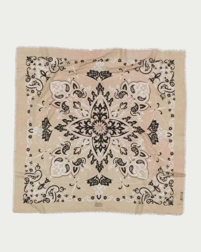 Beige bandana with black pattern on a white background