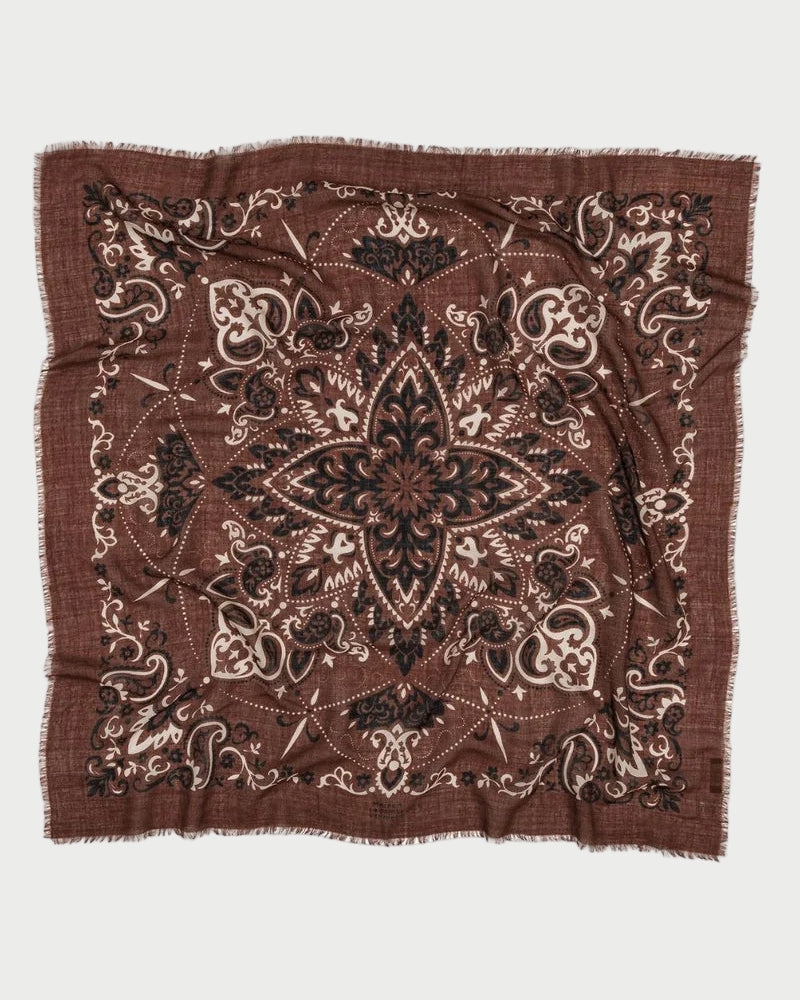 Brown patterned scarf on a white background