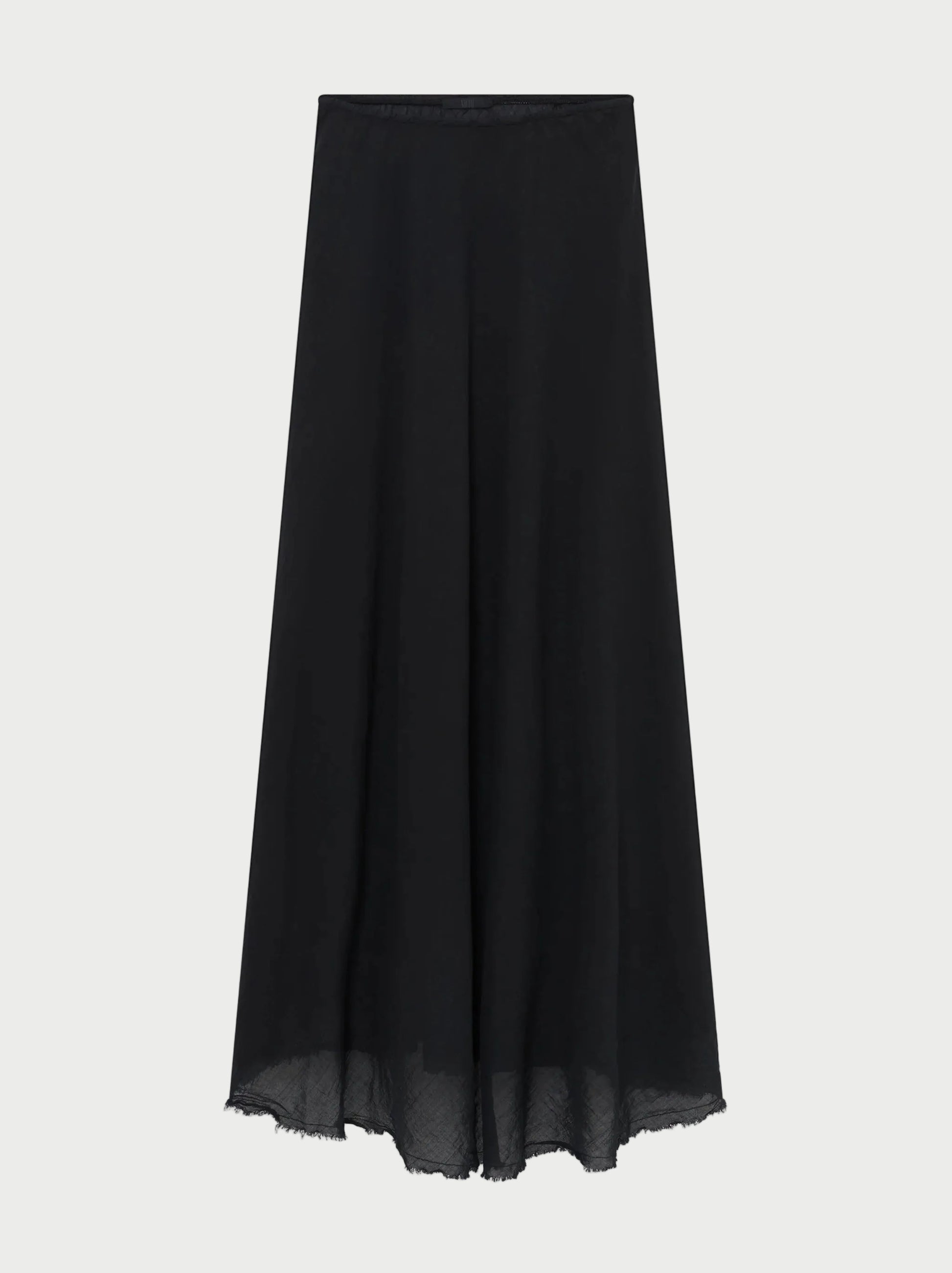 The All III Elysia Maxi Skirt by All III is a long, black, flowy A-line sheer maxi skirt crafted from lightweight fabric, featuring a clean waistband and an unfinished hem.