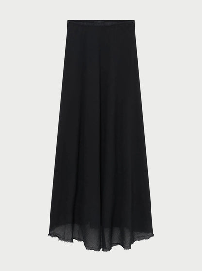 The All III Elysia Maxi Skirt by All III is a long, black, flowy A-line sheer maxi skirt crafted from lightweight fabric, featuring a clean waistband and an unfinished hem.