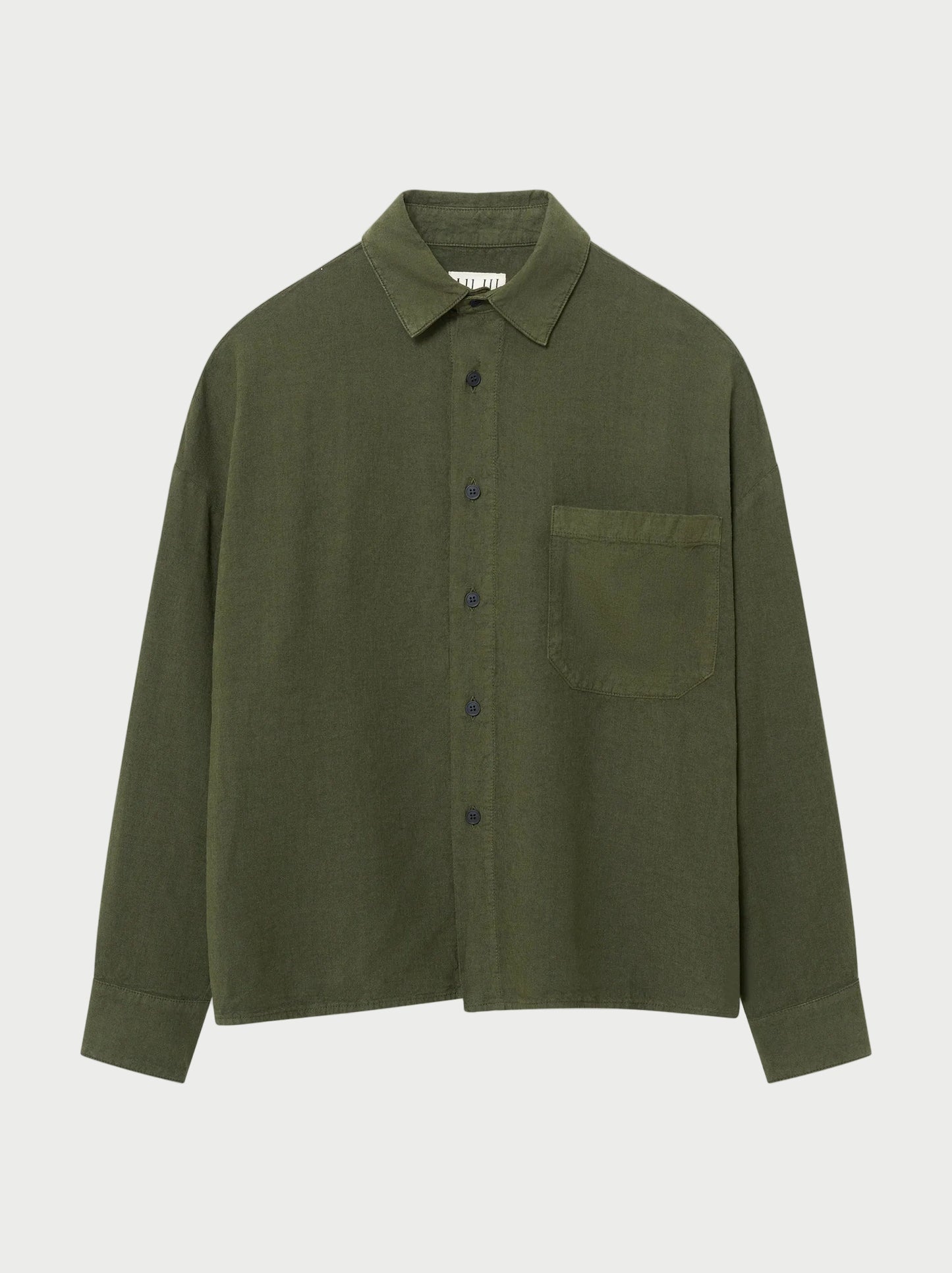 Green shirt with a pocket on a white background