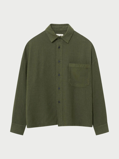 Green shirt with a pocket on a white background