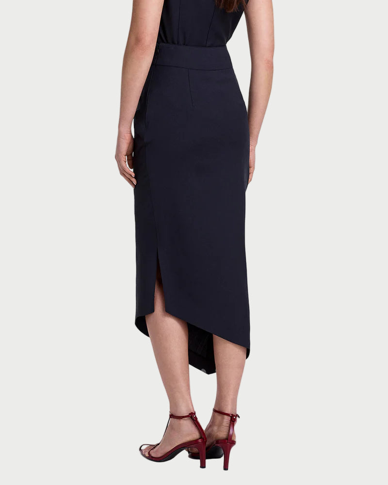 Woman wearing a black sleeveless dress on a white background