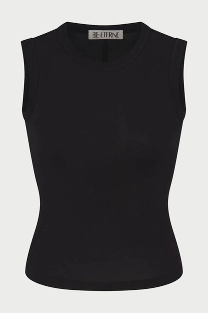 The Éterne Fitted Muscle Tank by Eterne is a sleeveless, fitted black top featuring a crew neckline. Made from a smooth and stretchy cotton-modal blend, this muscle tank offers a snug, comfortable fit and includes the brand’s signature “ETERNE” label inside the collar.