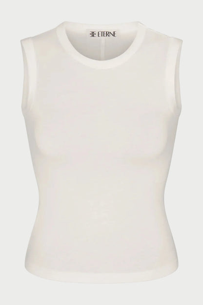 The Éterne Fitted Muscle Tank by Eterne features a sleeveless, slim fit silhouette with a crew neckline and subtle ribbed texture. Crafted from a soft cotton-modal blend, the label “ETERNE” appears inside the collar. Set against a plain white background.