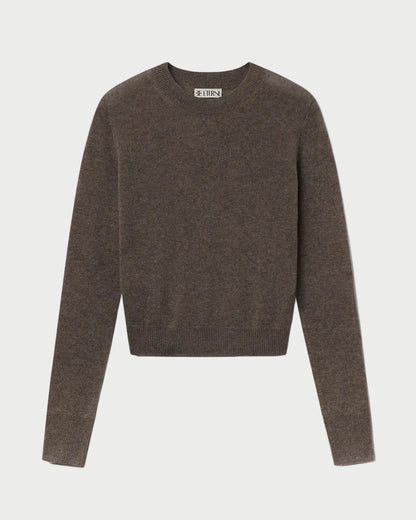 The ÉTERNE Francis Sweater by Eterne is a brown, slim-fit crewneck with long sleeves, shown laid flat on a white background.