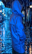 Load image into Gallery viewer, Rains long rain jacket in a cool blue at westport ct boutique WEST and online at west2westport.com