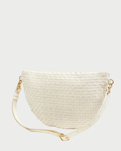 White woven handbag with a strap on a white background