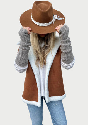 arm warmers and shearling vest at west2westport.com