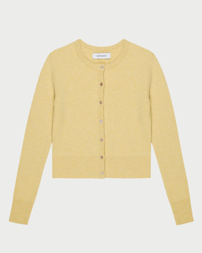 The SPRWMN Baby Cashmere Cardigan is a yellow knit with long sleeves and a round neckline, featuring a front closure with eight matching buttons. It's crafted from sustainably grown fibers and displayed on a plain white background.