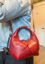 Load image into Gallery viewer, The shoulder strap on the henry beguelin hobo bag, available at west2westport.com