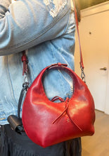 Load image into Gallery viewer, The shoulder strap on the henry beguelin hobo bag, available at west2westport.com