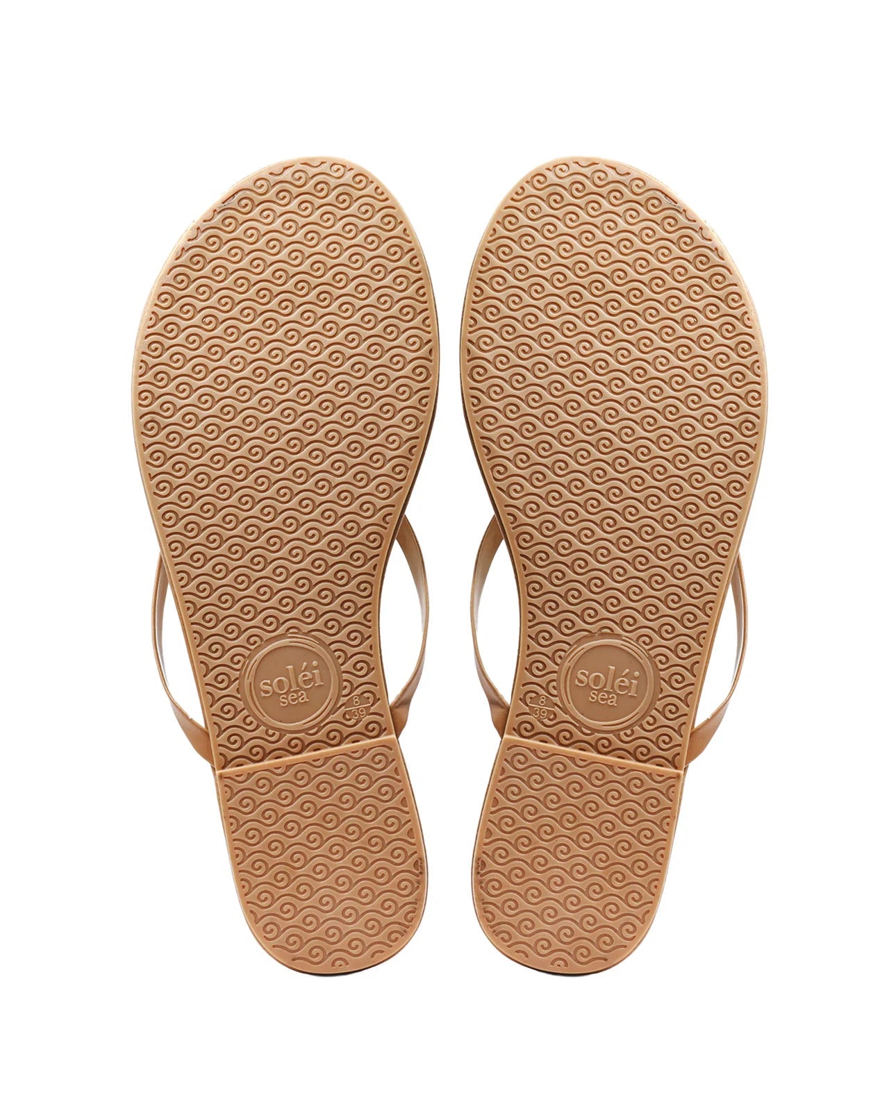 Tan flip-flop sandals with a textured sole on a white background