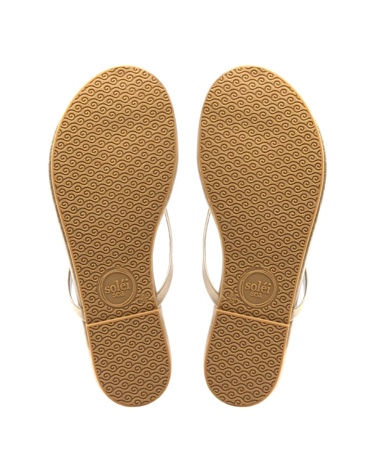 Pair of sandal soles with a textured pattern on a white background
