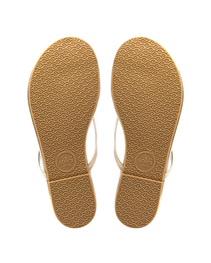Pair of sandal soles with a textured pattern on a white background