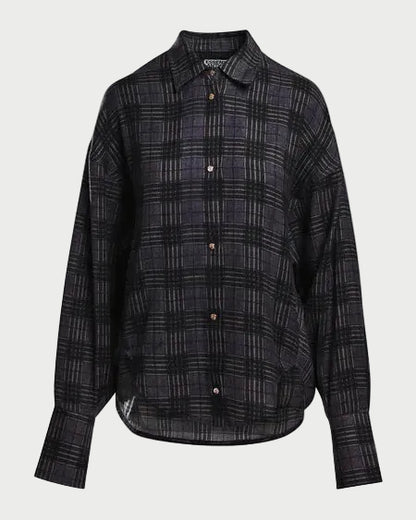 The Essentiel Antwerp Kiss Oversized Shirt w/Scarf by Essentiel Antwerp features a long-sleeve, button-up design with a grey and black check pattern, displayed against a plain white background.