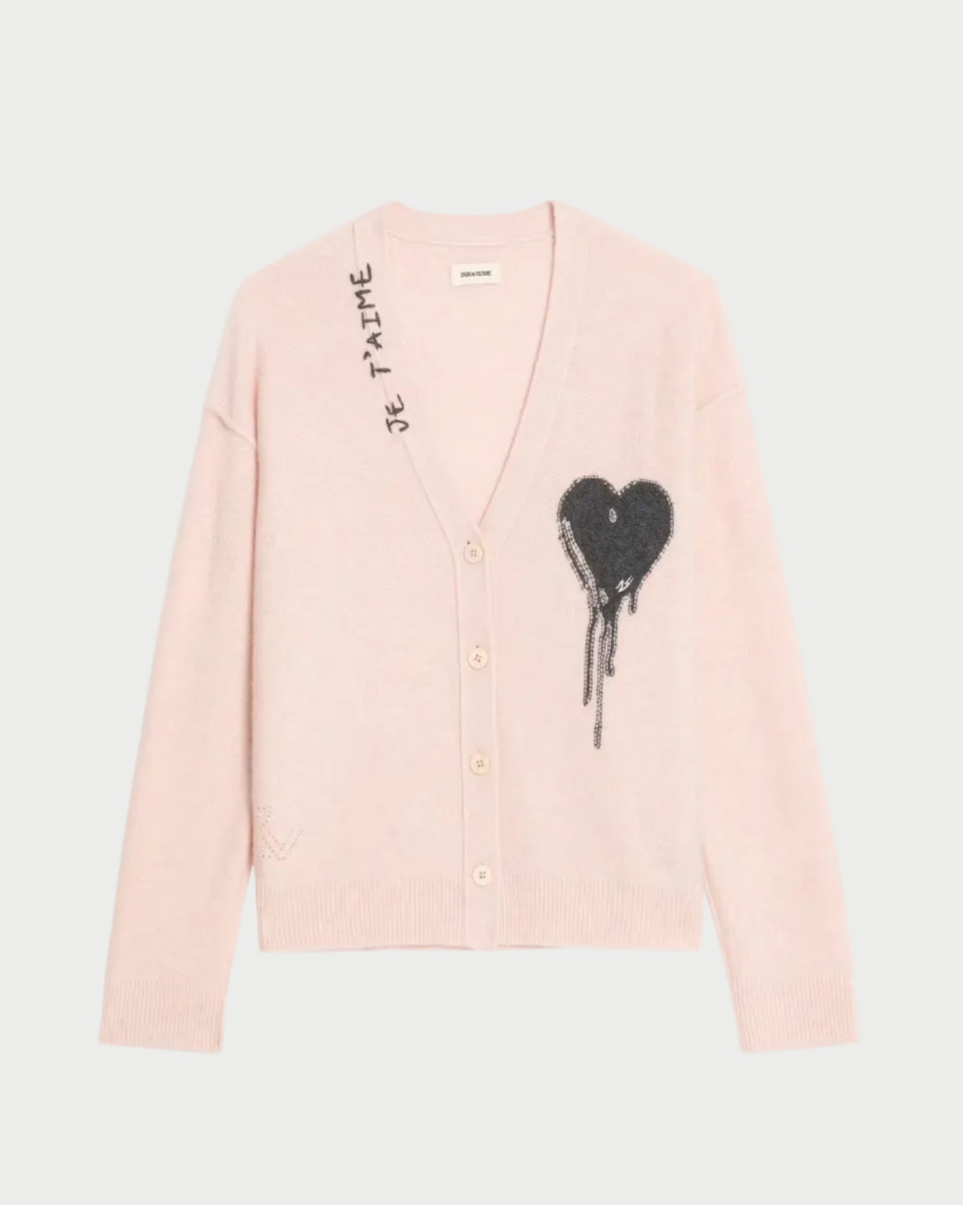 Pink cardigan with black heart design and 'Je T'aime' text on a white background