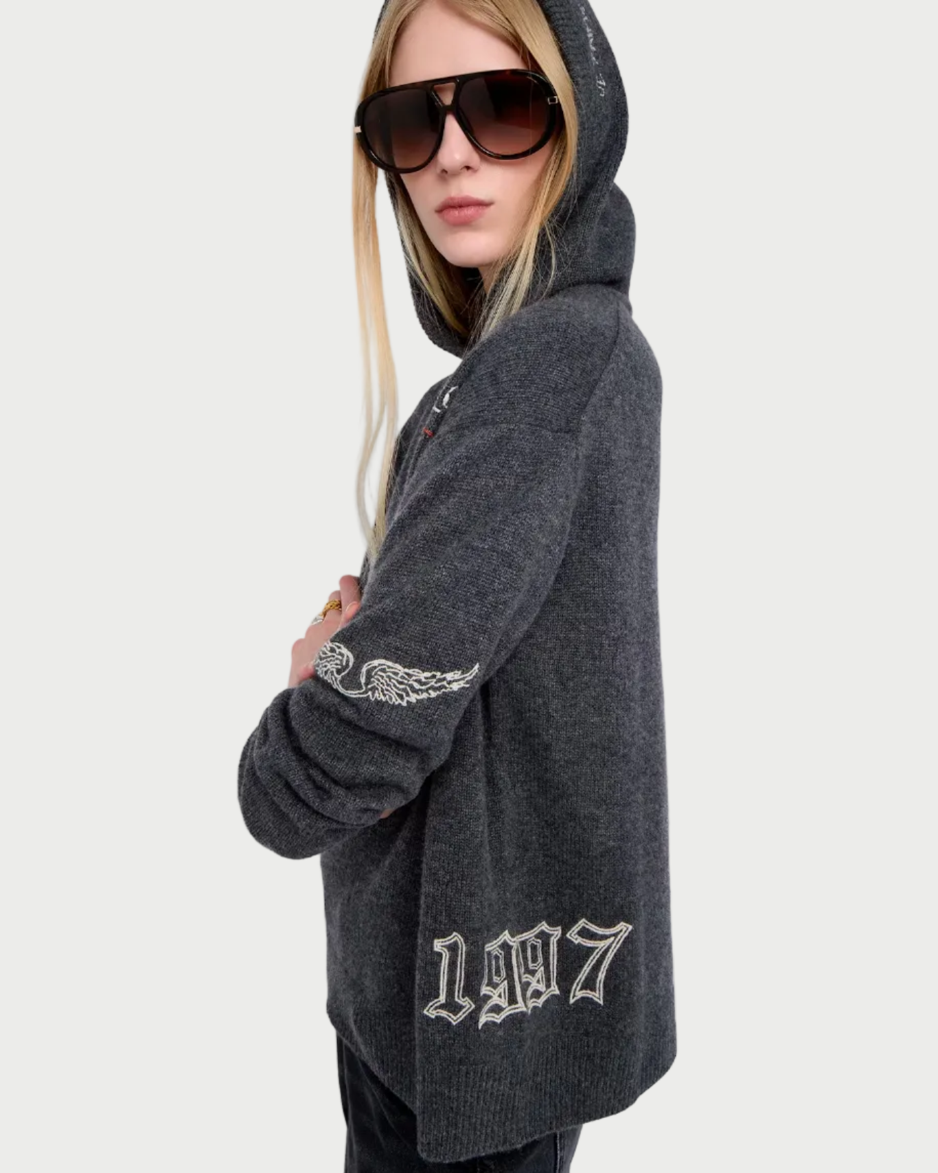 Person wearing a dark gray hoodie with '1917' branding on a white background