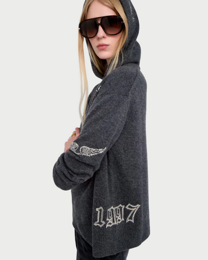 Person wearing a dark gray hoodie with '1917' branding on a white background