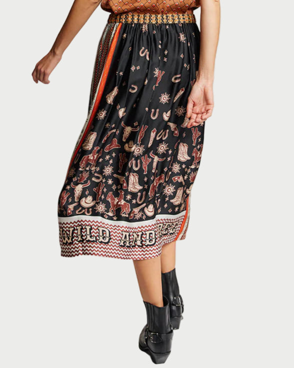 Woman wearing a patterned dress with a plain background