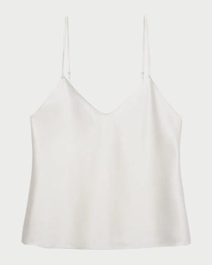 White spaghetti strap top on a white background