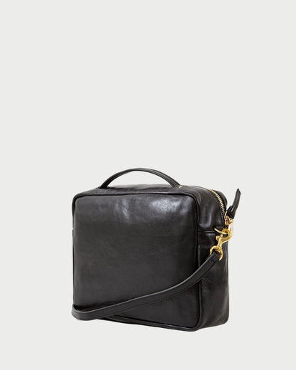 Black leather bag with gold zipper on a white background