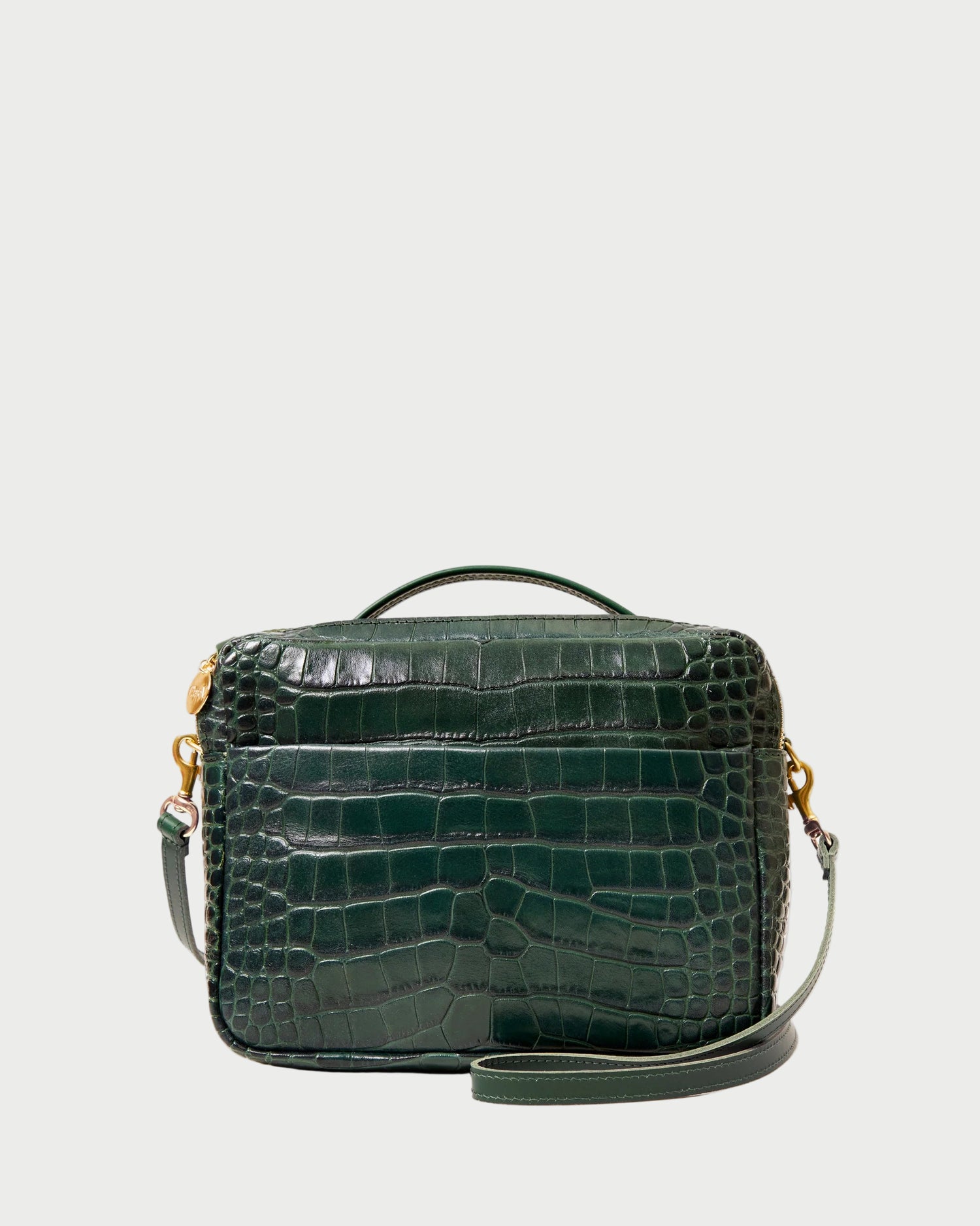 Green crocodile-patterned handbag on a white background