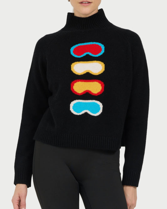 Black sweater with colorful goggles design worn by a model on a white background