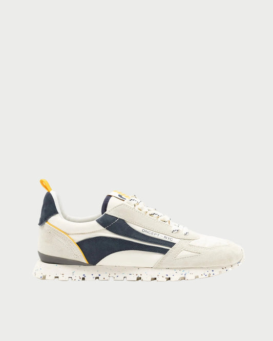 White sneaker with blue accents on a white background