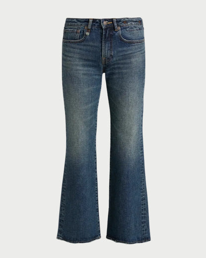 A pair of medium-wash blue denim flare jeans shown flat against a solid white background.
