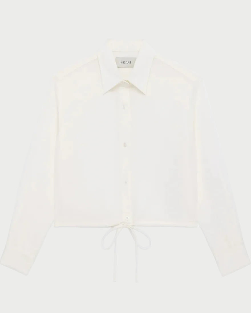 White blouse with long sleeves on a white background