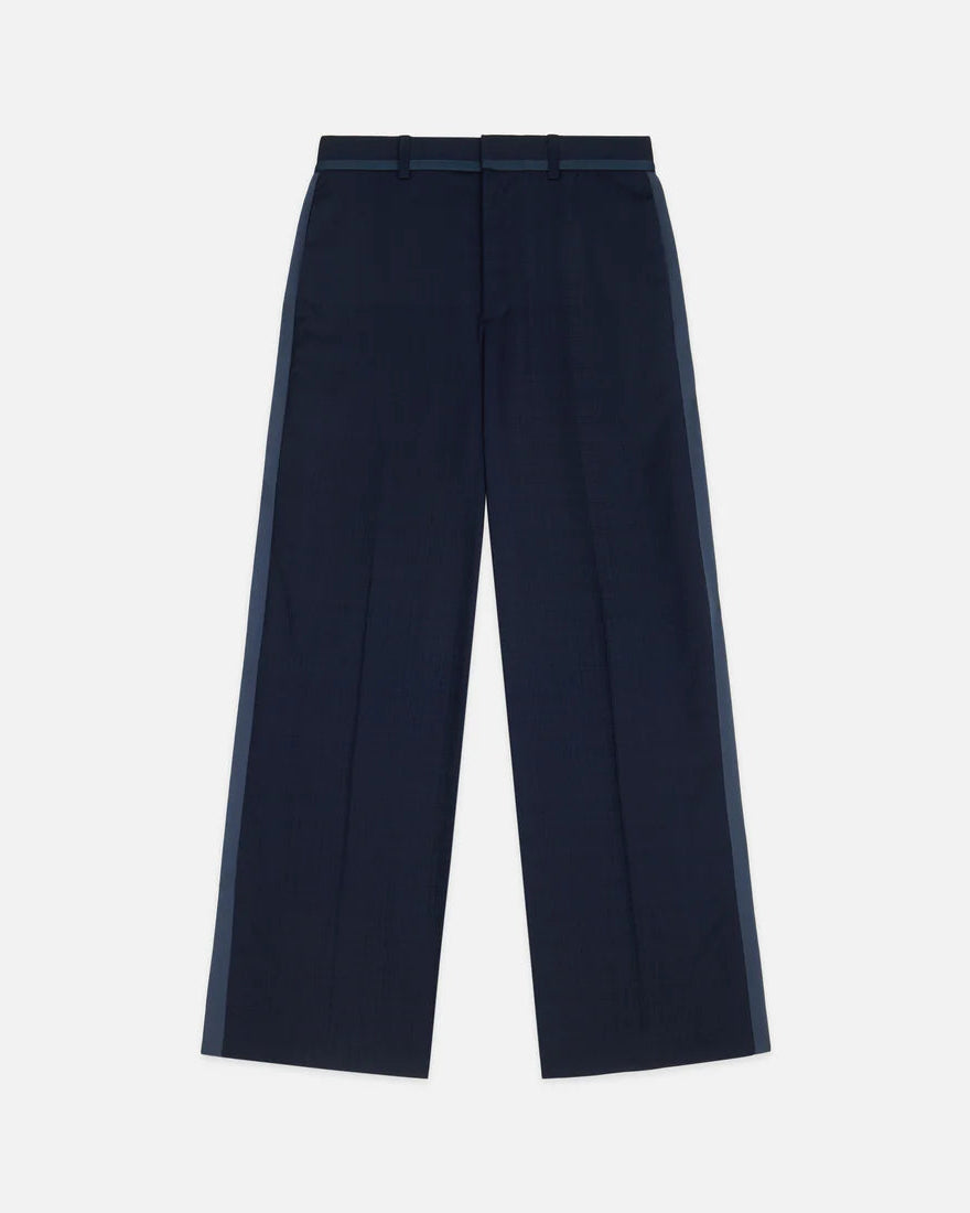 Navy blue pants on a light gray background