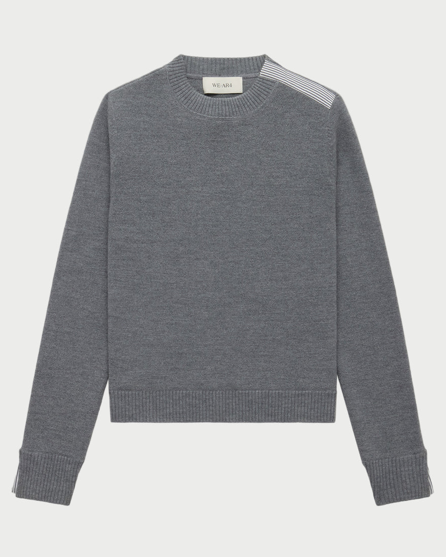 Gray sweater with striped shoulder details on a white background