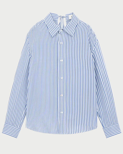 Blue and white striped shirt on a light gray background