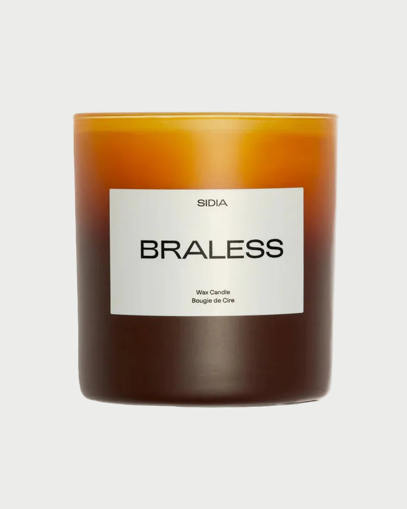 Candle with a label on a white background