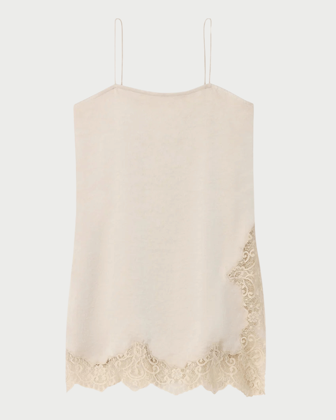 A light beige knit camisole top with thin spaghetti straps and a scalloped lace hem, shown against a plain light gray background.