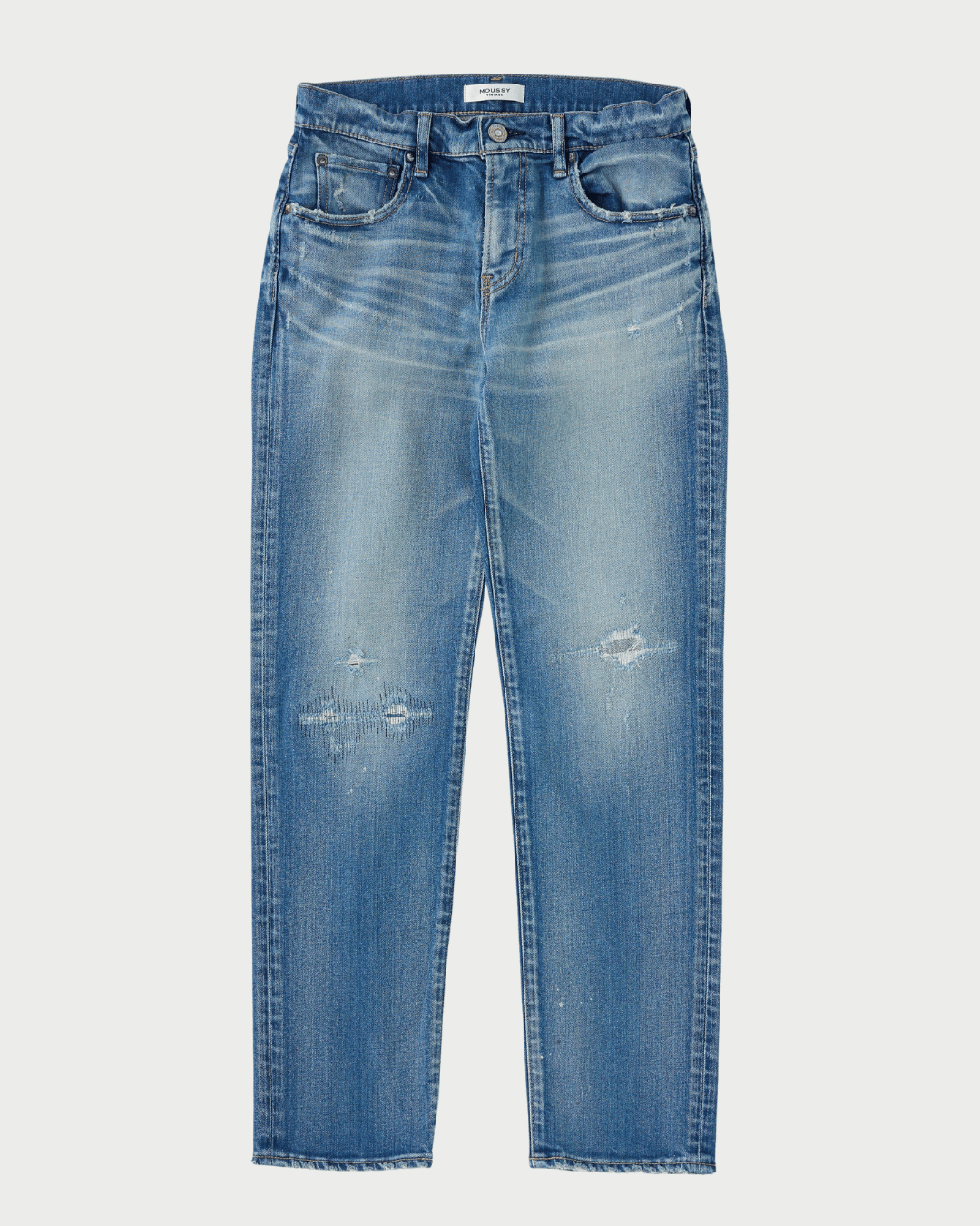 Light blue distressed denim jeans with whiskering and ripped details on the thighs, shown flat against a light gray background.