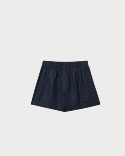 Navy blue skirt on a light gray background