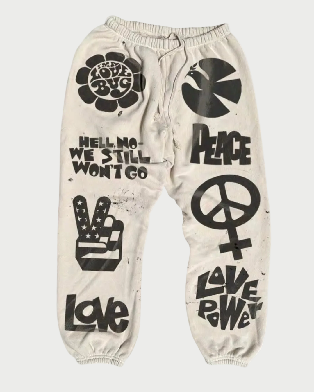 Beige sweatpants with black graphics and text on a white background