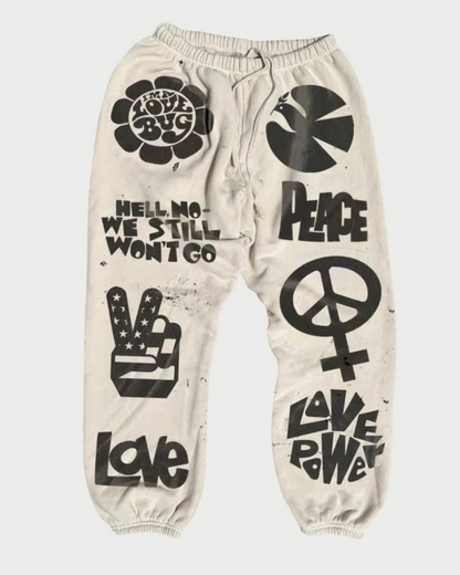 Beige sweatpants with black graphics and text on a white background